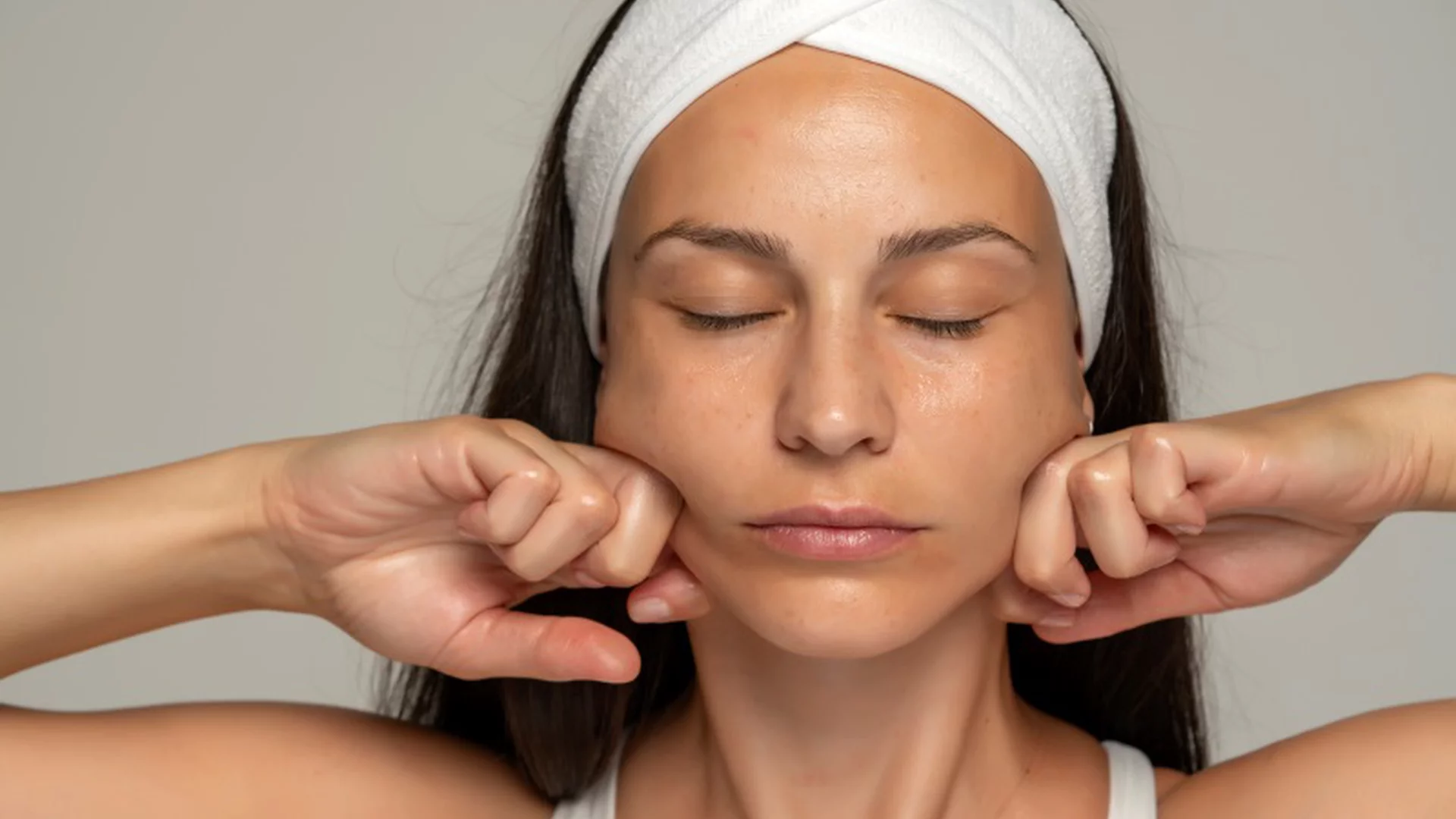 Closeup woman face massage
