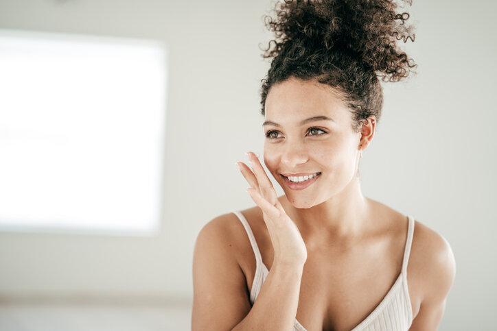 Young woman with well-groomed facial skin