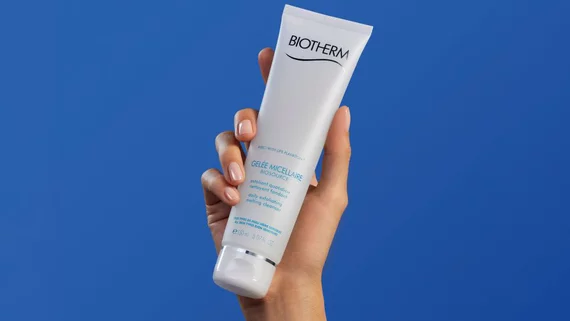 Biotherm Facial scrubs in hand