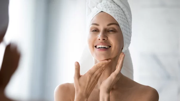 Woman with hand on face