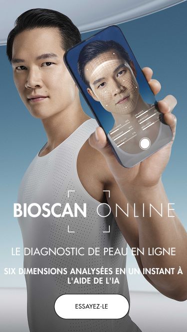 man holding a phone showing the bioscan service
